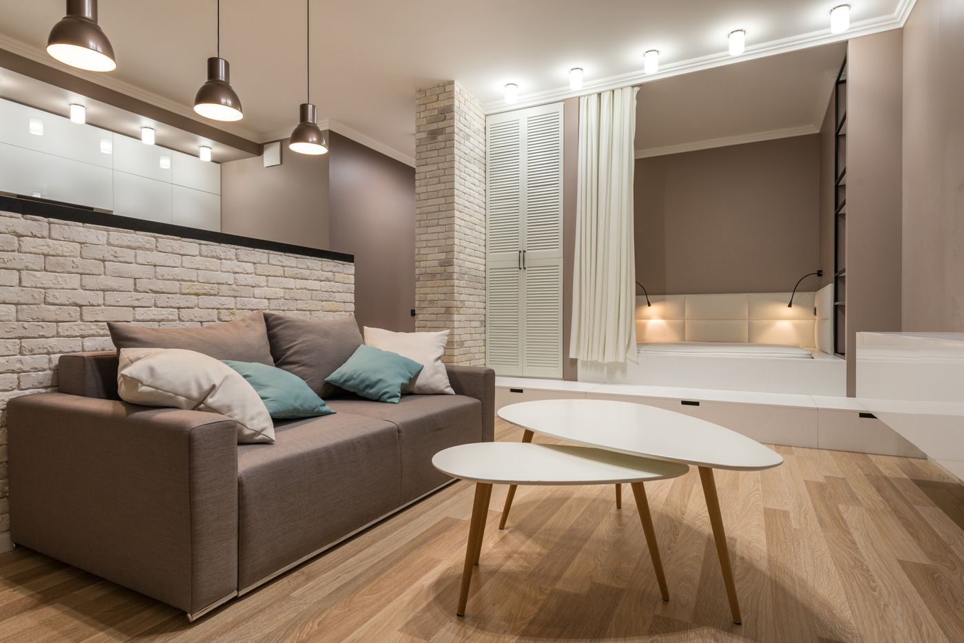 Stock inspiration: a living space with pendant lights and layered lighting.