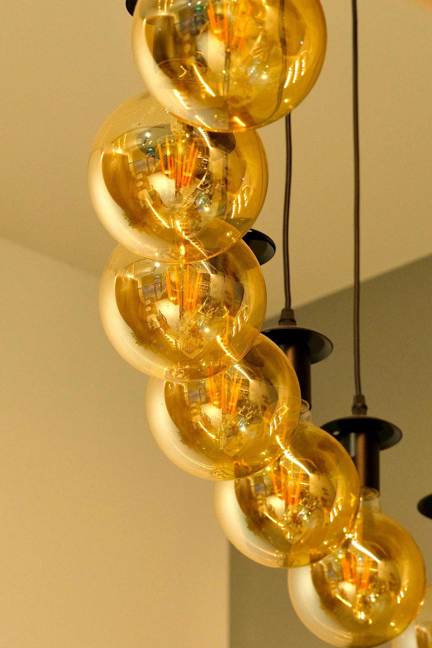 Stock inspiration: warm glass pendant lights in a contemporary interior.